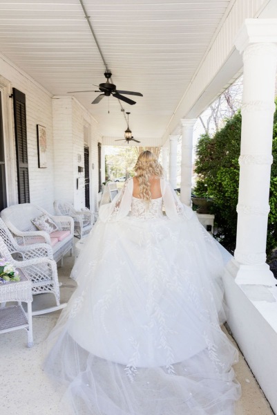 white-bride-BEST-DRESS-FRONT-PORCH-Magen-and-Chris-Puckett-Dobson-Photography-April-12-14-2025